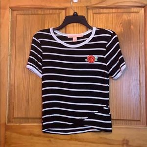 Black and white striped tee with rose accent